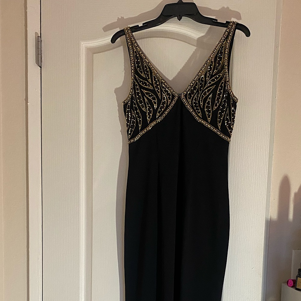 Rickie Freeman for T.J Nites, beautiful black and gold beading, floor length.